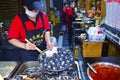 A Food Stall Staff is Preparing Stinky Tofu at Changsha China