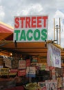 Food Stand at Local Carnival, Street Tacos, Bubble Tea, Elotes en Vaso -Mexican Corn in a Cup - and Hamburger Signs Royalty Free Stock Photo