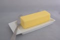 Stick of butter with knife Royalty Free Stock Photo