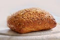 Food stuff. Closeup of freshly baked bread on a kitchen counter with copy space. Homemade wheat loaf ready to be sliced Royalty Free Stock Photo