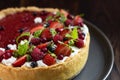 Food styling with fresh fruit tart berries