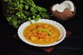 Food styling with Prawn malai curry and fresh coconut milk