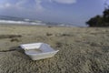 Food styrofoam boxes left on the beach