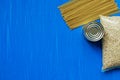 Food supplies crisis food stock for quarantine isolation period. Pasta, cans of canned food, toilet paper. Food donations or food Royalty Free Stock Photo