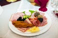 Food and table arrangement with fish, appetizers and vegetables