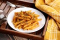 Food - Tasty Penne Pasta Plate with a Fork on Wooden Tray Royalty Free Stock Photo