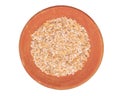Cracked Durum Wheat Background Texture in Red Terracotta Plate