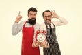 Food time. chef team in apron. Food delivery. fast food. bearded men with alarm clock. lunch time. idea. deadline. cafe Royalty Free Stock Photo