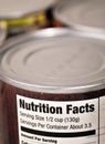 Food tin cans with nutrition facts label Royalty Free Stock Photo