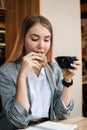 Food to Boost Brain and Memory, brainpower, nutrients for brain function. Girl student studying in cafe with cookies and