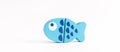 Food toy fish on white background. Creative wooden design. Child development. Kids play.