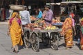 Food trader selling fruits in street market. Pushkar, Rajasthan, India