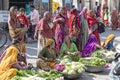 Food trader selling vegetables in street market. Pushkar, Rajasthan, India