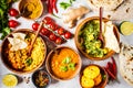 Food traditional Indian cuisine. Dal, palak paneer, curry, rice, chapati, chutney in wooden bowls on white background Royalty Free Stock Photo