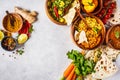 Food traditional Indian cuisine. Dal, palak paneer, curry, rice, chapati, chutney in wooden bowls on white background Royalty Free Stock Photo