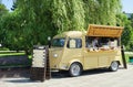 Food trailer in park. Summer outdoor bistro. Buy food.