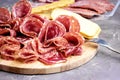 Food Tray With Delicious Salami Pieces of Sliced Ham and Crackers and Bread Sticks Meat Plate Royalty Free Stock Photo