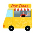 Food truck with hot dogs and smiling seller offering fresh dish