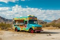 A food truck that offers refreshments and meals is parked in a barren desert landscape, Tex-Mex food truck in a desert landscape,