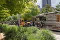 Food truck vendor with customer buy and taste variety of food