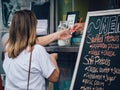 Sanford, Florida - July 20, 2019: Food Truck Festival. Customer Paying with Credit Card.