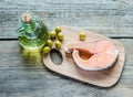 Food with unsaturated fats - salmon and olive oil