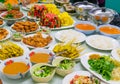 Food Variety Table top Fried chicken Fried fish roasted pork papaya