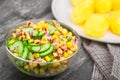 Food vegetable salad with corn and cucumbers healthy green meal Royalty Free Stock Photo