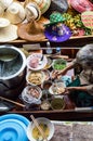 Food vendor at Damnoen Saduak Floating Market, Thailand.