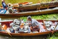 Food vendor at Damnoen Saduak Floating Market, Thailand.