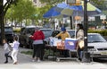 Food vendor preparing food for sale outdoors Bronx New York