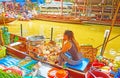 The food vendor in sampan, Damnoen Saduak floating market, Thailand