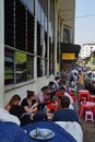 Food vendor stall at the side of the main building of Bogyoke Market at Bo Gyoke Road, Yangon, Myanmar