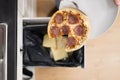Food Waste. Throw Away Pizza Royalty Free Stock Photo
