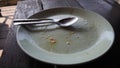 Food waste. Top view piece of food remains on plate. Royalty Free Stock Photo