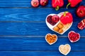 Food which help heart stay healthy. Vegetables, fruits, nuts in heart shaped bowl on blue wooden background top view Royalty Free Stock Photo