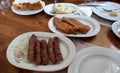 Food on a wooden table in a restaurant Royalty Free Stock Photo