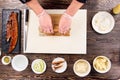 Food wrapping in sushi bamboo mat, top view.