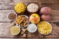 Foods high in carbohydrate on rustic wooden background Royalty Free Stock Photo