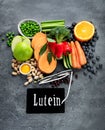 Foods high in lutein on dark background Royalty Free Stock Photo