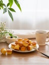 Foods such as small cakes and coffee on the table Royalty Free Stock Photo