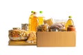 Foodstuff for donation, storage and delivery. Various food, pasta, cooking oil and canned food in cardboard box