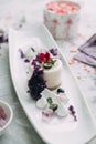 Foodstyling with decor and sweets in purple Royalty Free Stock Photo