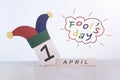 Fools` Day, date April 1 on wooden calendar