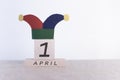 Fools` Day, date April 1 on wooden calendar