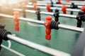 Foosball, game and table for entertainment, fun and team activity with artificial toy or players in zoom. Plastic Royalty Free Stock Photo
