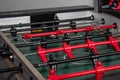 foosball game table in red and black color Royalty Free Stock Photo