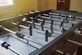 Foosball in the room close-up. Sports childrens game.