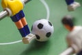 Foosball table players Royalty Free Stock Photo