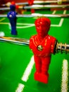 Foosball. Table with red and blue players detail perspective. Royalty Free Stock Photo